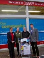 The management of Tesco in Penicuik agreed to let the Rotary seek donations from the staff and public of the small items required for the Mary's Meals Back Pack scheme. 
